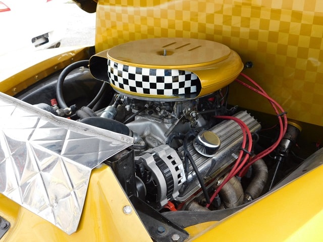 Classic Chevy truck engine bay with checkered air filter