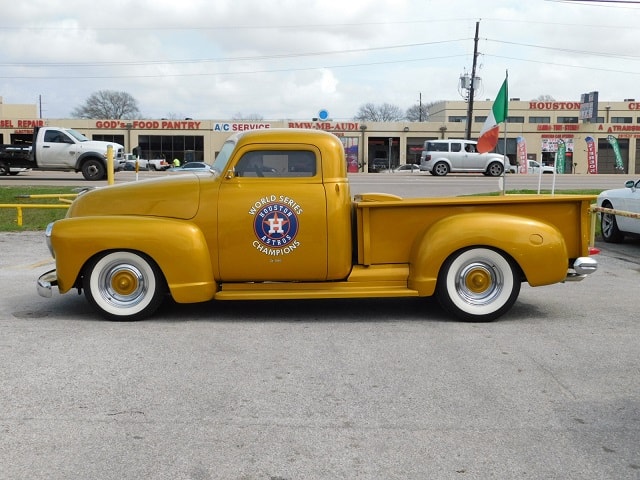 Classic Chevy truck side profile with Houston Astros World Series Champions emblem