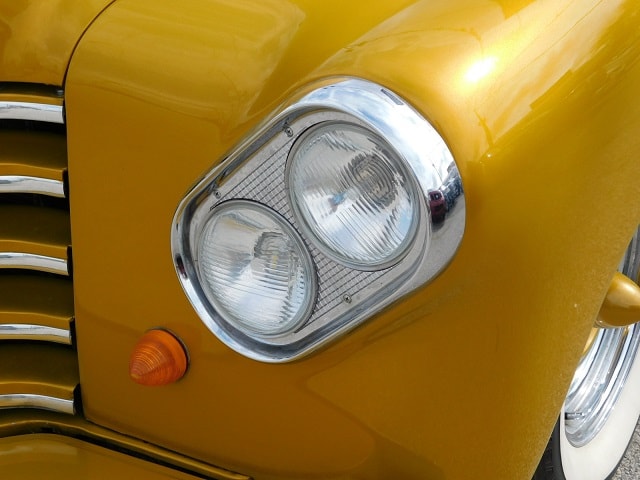 Classic Chevy truck dual headlight closeup