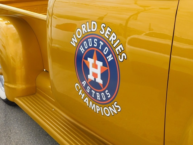Houston Astros World Series Champions emblem on classic truck door