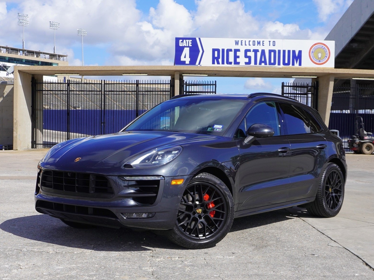 Black Porsche Macan at Rice Stadium gate